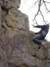 Corley Swinging Across The Rock Face